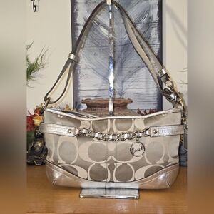 Coach Signature Canvas And Silver Metallic Leather Hobo. GUC